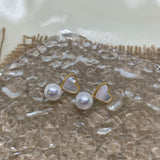 Heart-shaped white fritillaria and freshwater pearl stud earrings.