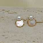 Freshwater pearl and fritillaria earrings with gold-toned settings.
