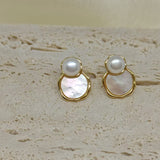 Freshwater pearl and fritillaria earrings with gold-toned settings.