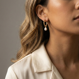 14K gold plated hoop earrings with a white pearl drop.