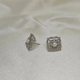 Two silver quadrate vintage stud earrings with freshwater pearls and diamonds.