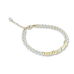 A freshwater pearl bracelet with gold-plated square beads and a lobster clasp.