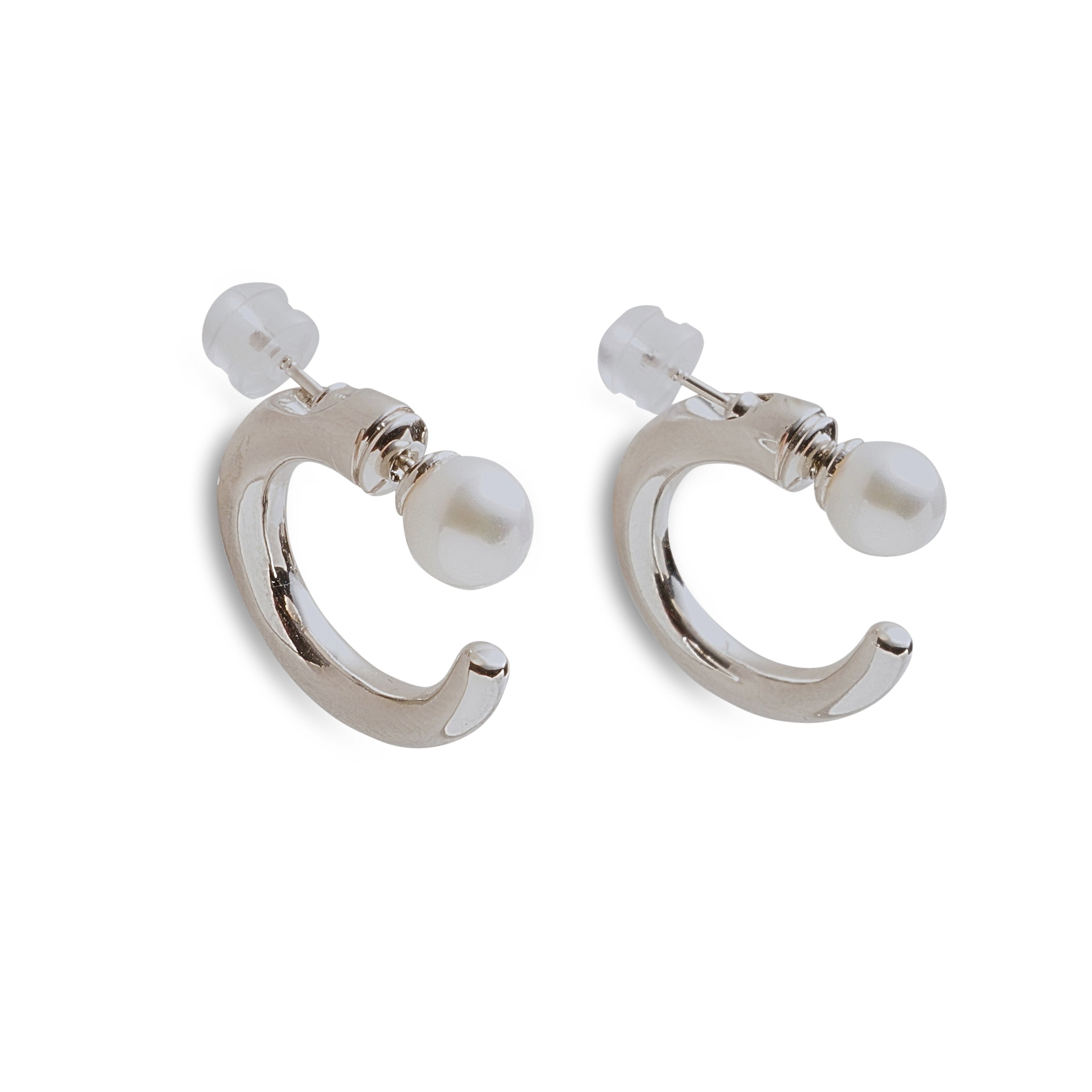 Two silver hoop earrings with a white pearl on each, secured by a clear backing.