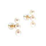 Two pearl earrings, each with three white pearls in a vertical line, are shown.