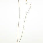 Caellia 14K gold dainty freshwater pearl pendant necklace on a delicate chain.