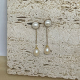 CAELLIA gold-plated dangle earrings featuring a round pearl stud and a teardrop pearl drop.