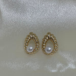 CAELLIA freshwater pearl drop earrings featuring a vintage style water drop shaped gold setting.