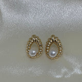 CAELLIA freshwater pearl drop earrings featuring a vintage style water drop shaped gold setting.