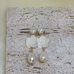 Caellia 14K gold dangle earrings featuring a camellia flower stud and a freshwater pearl drop.