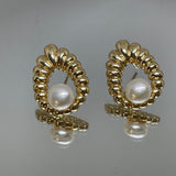 CAELLIA vintage style earrings featuring a freshwater pearl set in a gold ribbed drop frame.