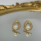 CAELLIA vintage style freshwater pearl drop earrings with a gold water drop shaped setting.