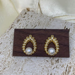 CAELLIA vintage style gold water drop earrings featuring a central freshwater pearl.
