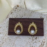 CAELLIA vintage style gold water drop earrings featuring a central freshwater pearl.