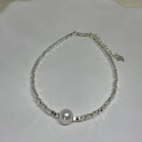 CAELLIA freshwater pearl bracelet with a 925 sterling silver beaded chain on a white background.