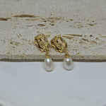 CAELLIA gold plated earrings featuring a vintage rose design and a dangling freshwater pearl.