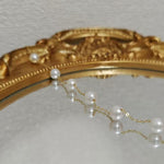 CAELLIA freshwater pearl bracelet featuring seven pearls on a delicate gold-plated silver chain.