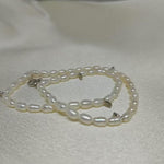 CAELLIA double wrapped freshwater pearl bracelet with gold plated sterling silver accents.