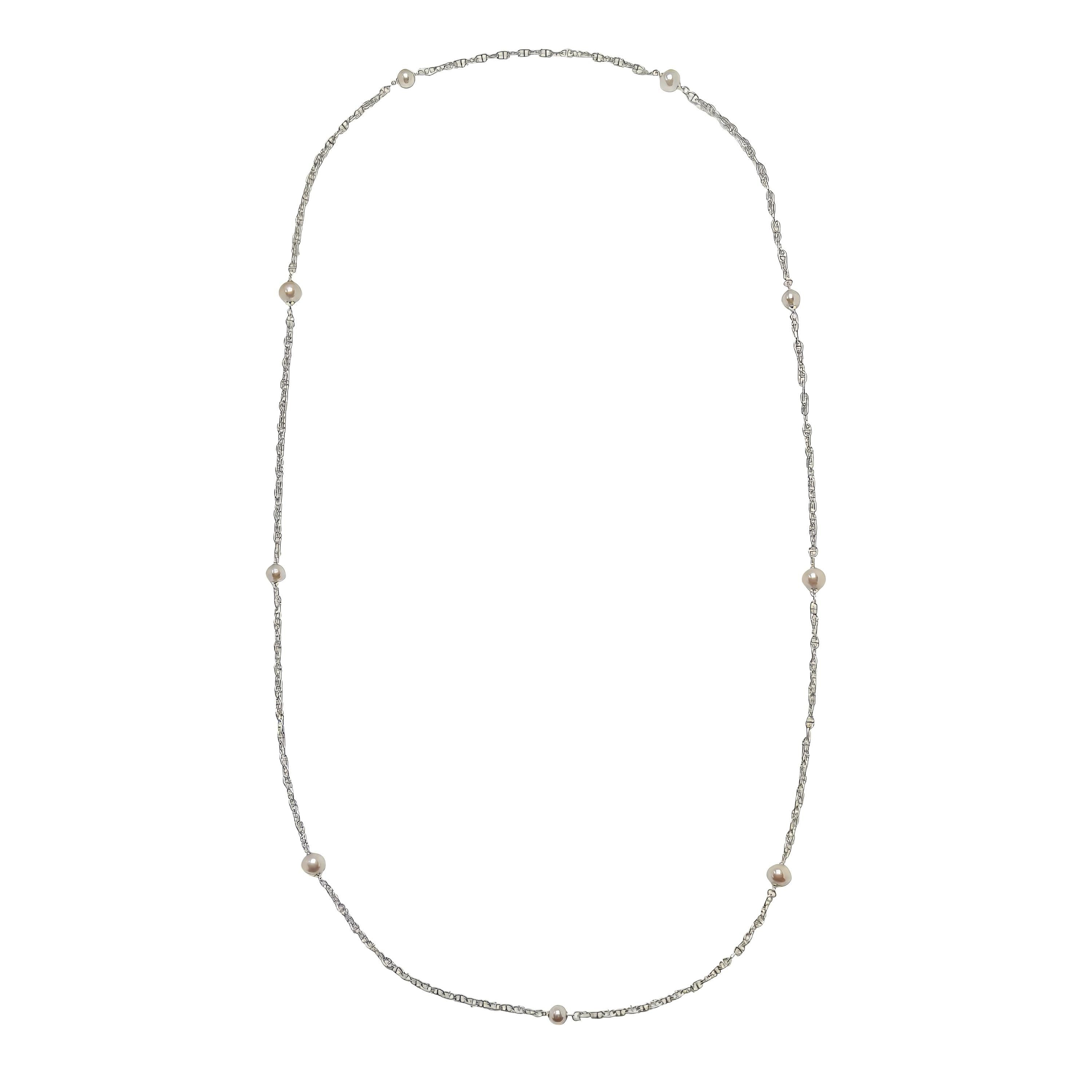 Caellia sterling silver chain necklace featuring evenly spaced freshwater pearls.