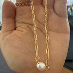 Caellia 18K gold paperclip chain necklace featuring a single baroque freshwater pearl.