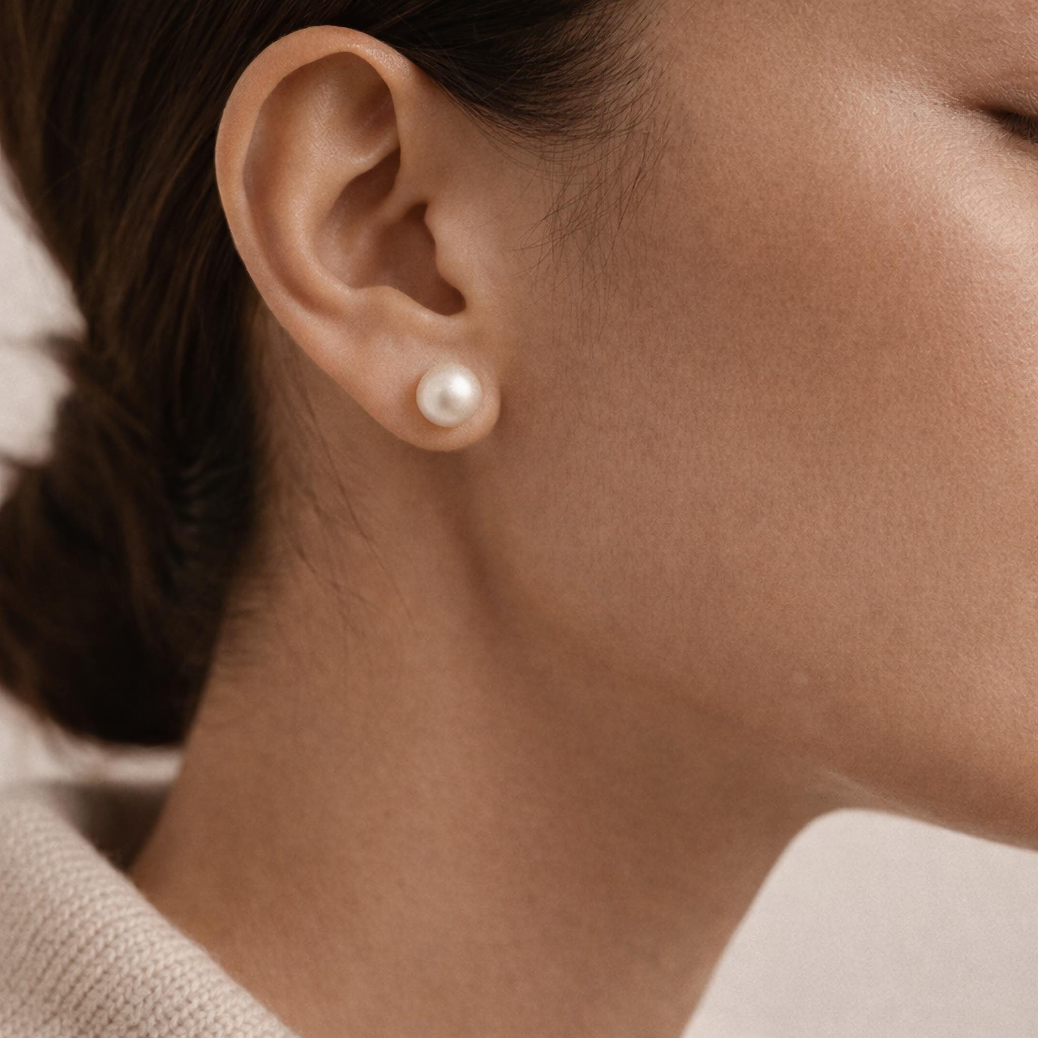 Freshwater pearl stud earrings in sterling silver and gold plated finish