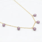 CAELLIA dainty lavender freshwater pearl necklace on a 14K gold plated chain.