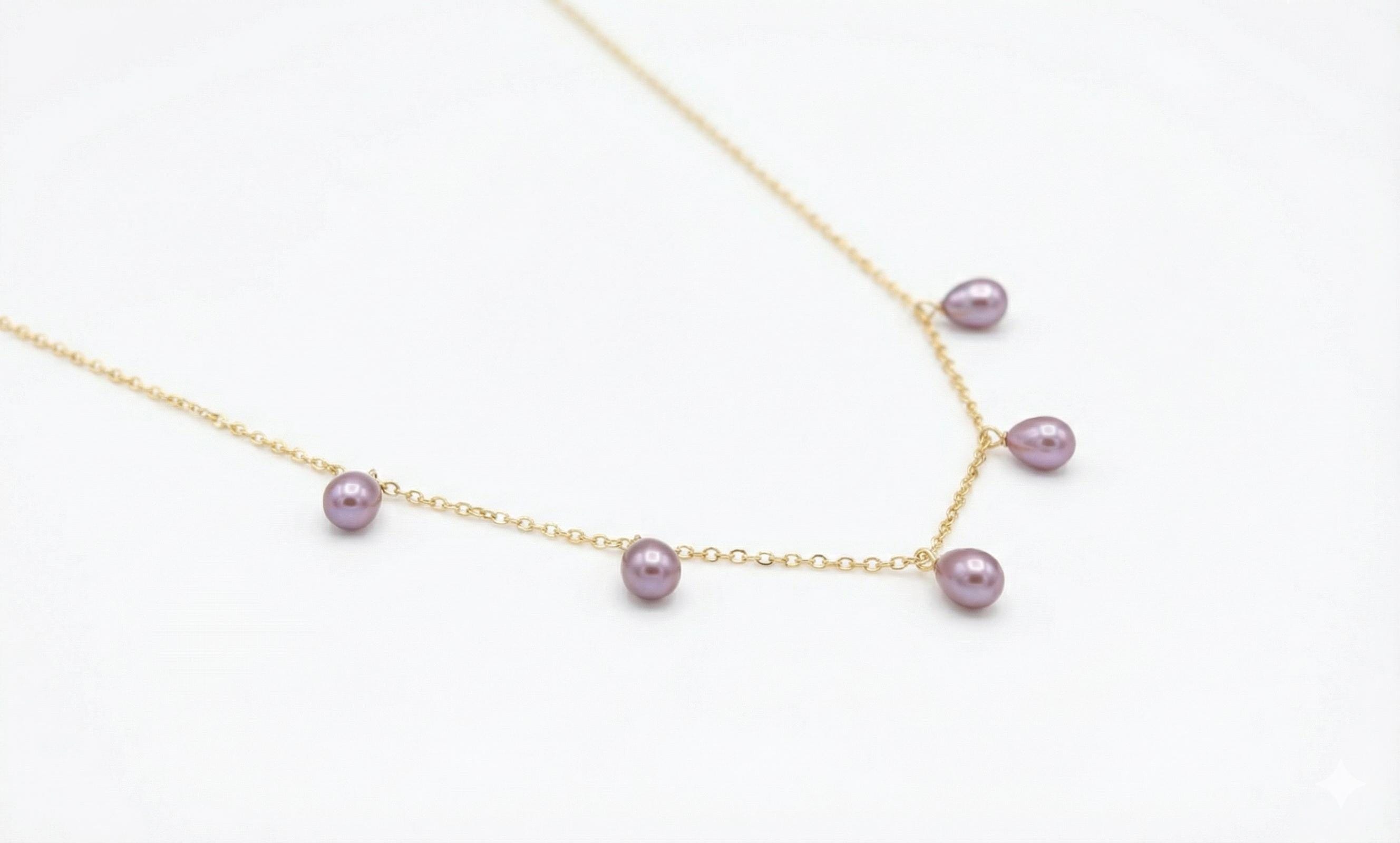 CAELLIA dainty lavender freshwater pearl necklace on a 14K gold plated chain.