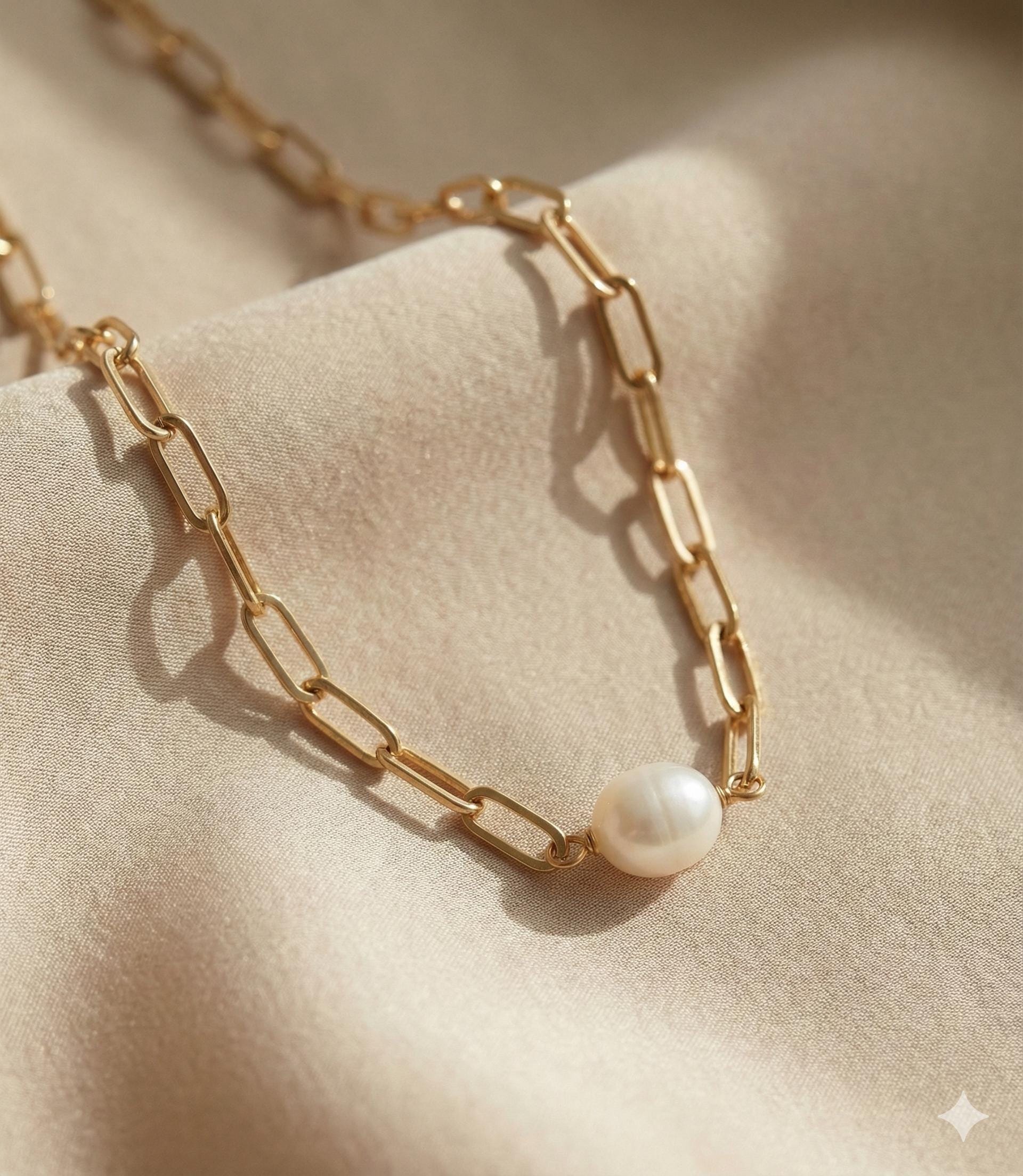 Caellia 18K gold paperclip chain necklace featuring a single baroque freshwater pearl.