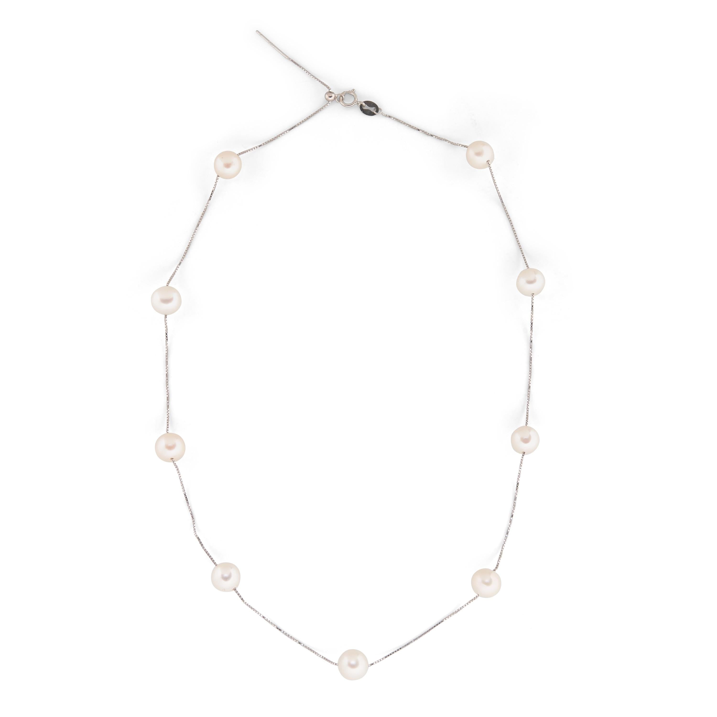 Caellia 14K gold dainty necklace featuring multiple freshwater pearls on a delicate chain.