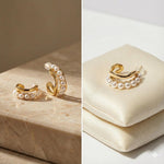 Caellia 14K gold filled hoop earrings featuring a row of lustrous freshwater pearls.