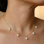 CAELLIA dainty lavender freshwater pearl necklace on a 14k gold plated chain.