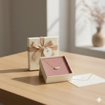 Caellia 18k gold dainty freshwater pearl choker necklace displayed in an open gift box.