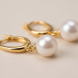 Pearl earrings listing image - Detail macro shot