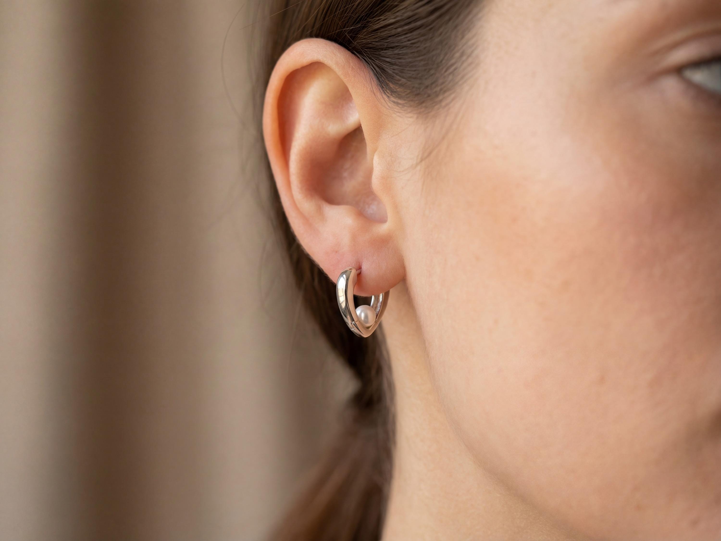 Pearl earrings listing image - On-ear lifestyle crop