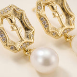 Macro close-up of openwork rose motifs sparkling accents and pearl drops