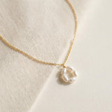 Pearl necklace listing image - Flat lay luxury shot