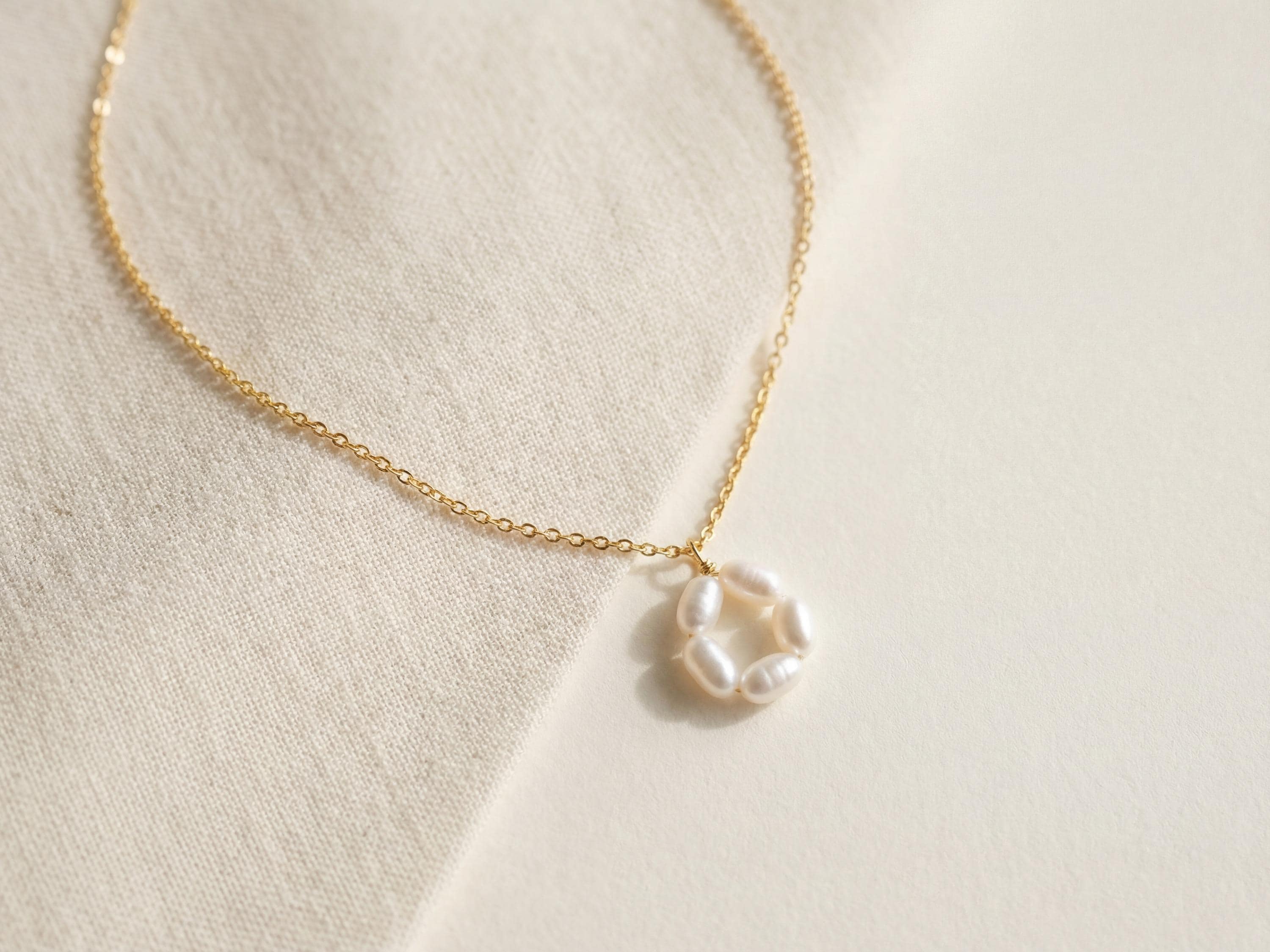 Pearl necklace listing image - Flat lay luxury shot