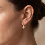 Pearl earrings listing image - On-ear lifestyle crop