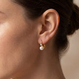 Pearl earrings listing image - On-ear lifestyle crop