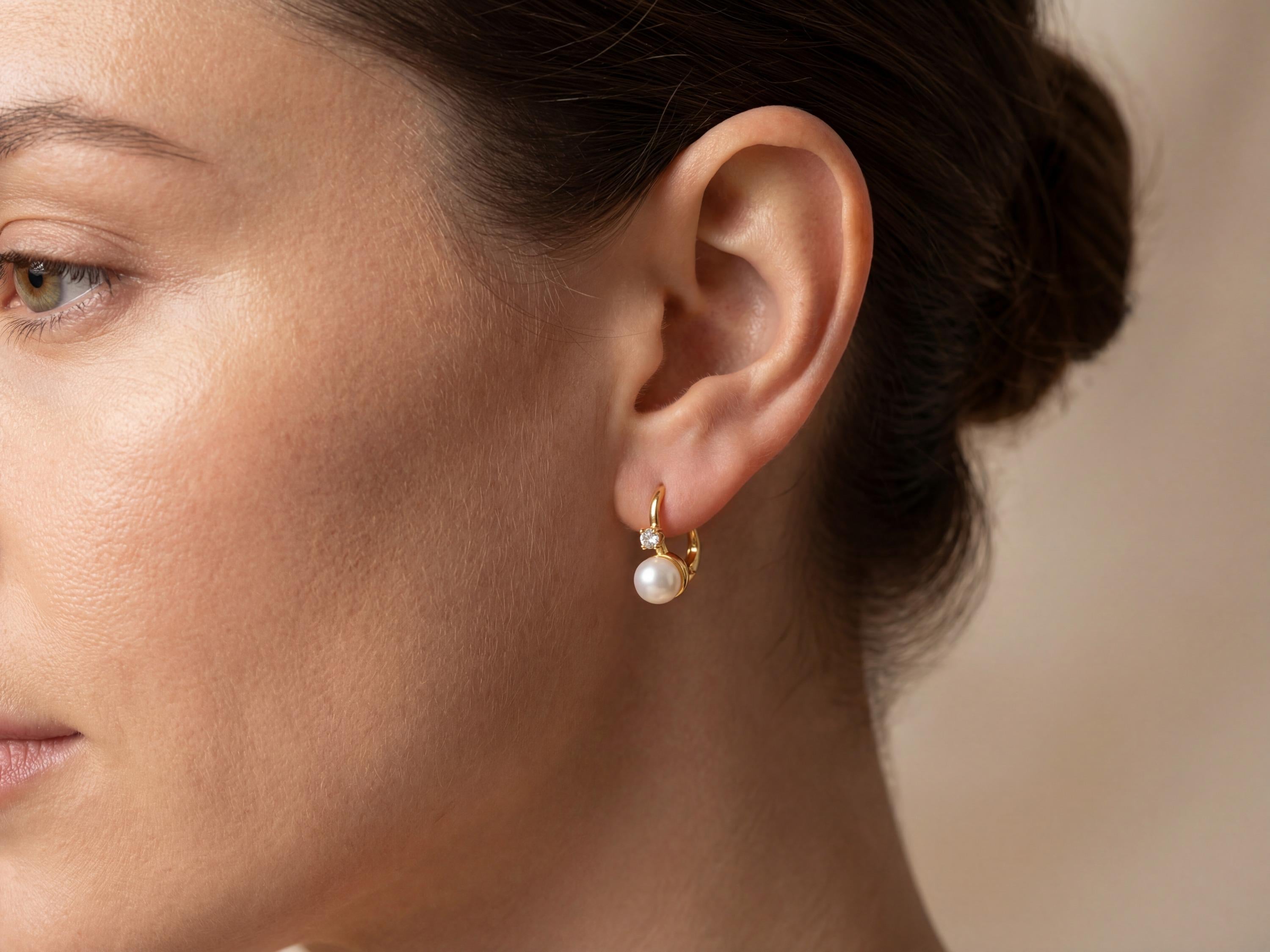 Pearl earrings listing image - On-ear lifestyle crop