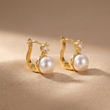 Pearl earrings listing image - Mejuri-like sculptural close-up
