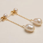 Pearl earrings listing image - Detail macro shot