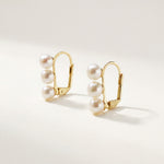 Front product view of matching triple freshwater pearl leverback earrings