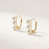 Front product view of matching triple freshwater pearl leverback earrings