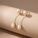 Pearl earrings listing image - Mejuri-like sculptural close-up