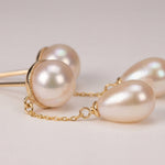Pearl earrings listing image - Detail macro shot
