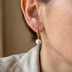 Pearl earrings listing image - On-ear lifestyle crop