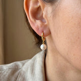Pearl earrings listing image - On-ear lifestyle crop