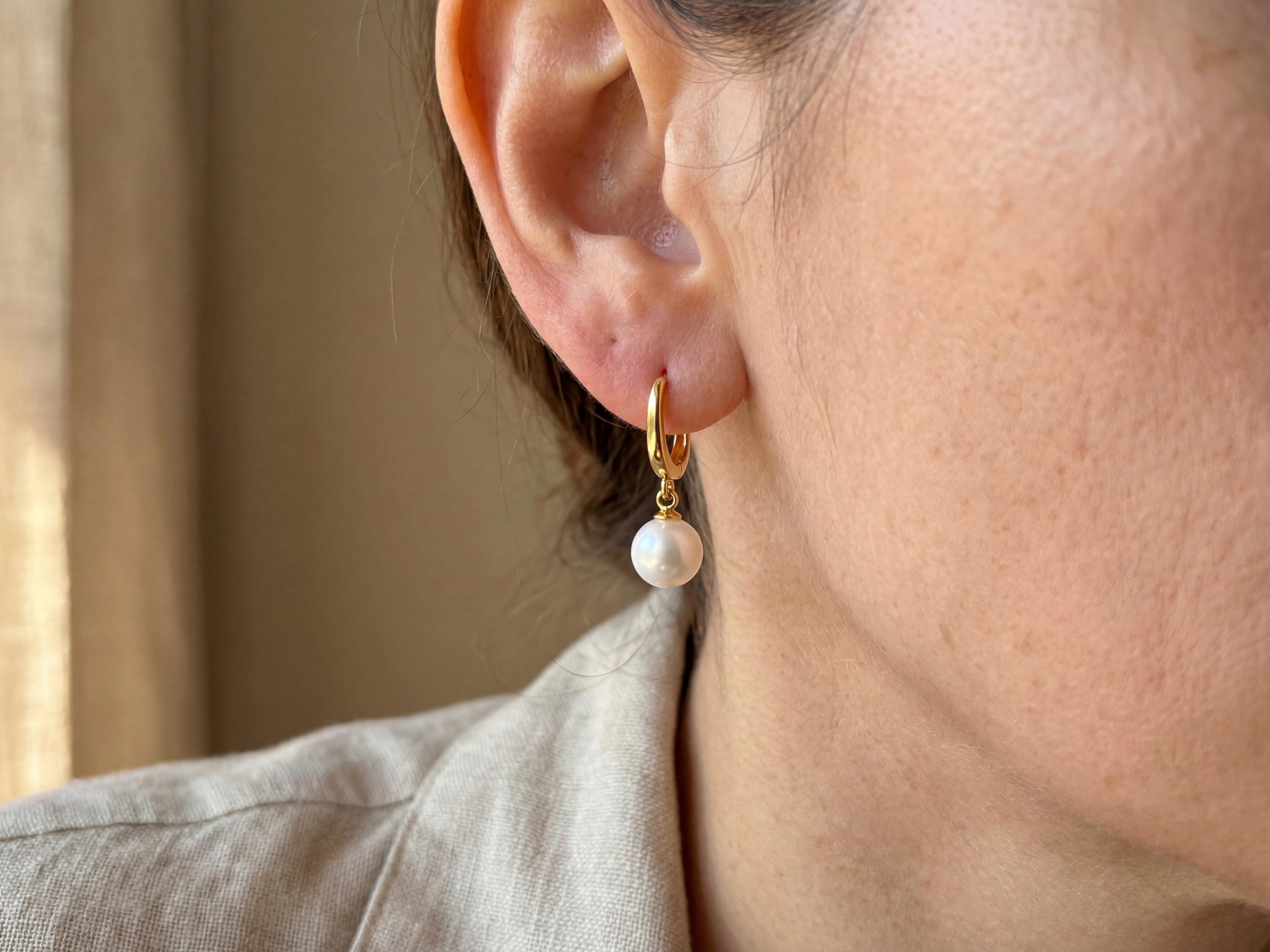 Pearl earrings listing image - On-ear lifestyle crop