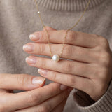 Pearl necklace listing image - Soft editorial hands shot
