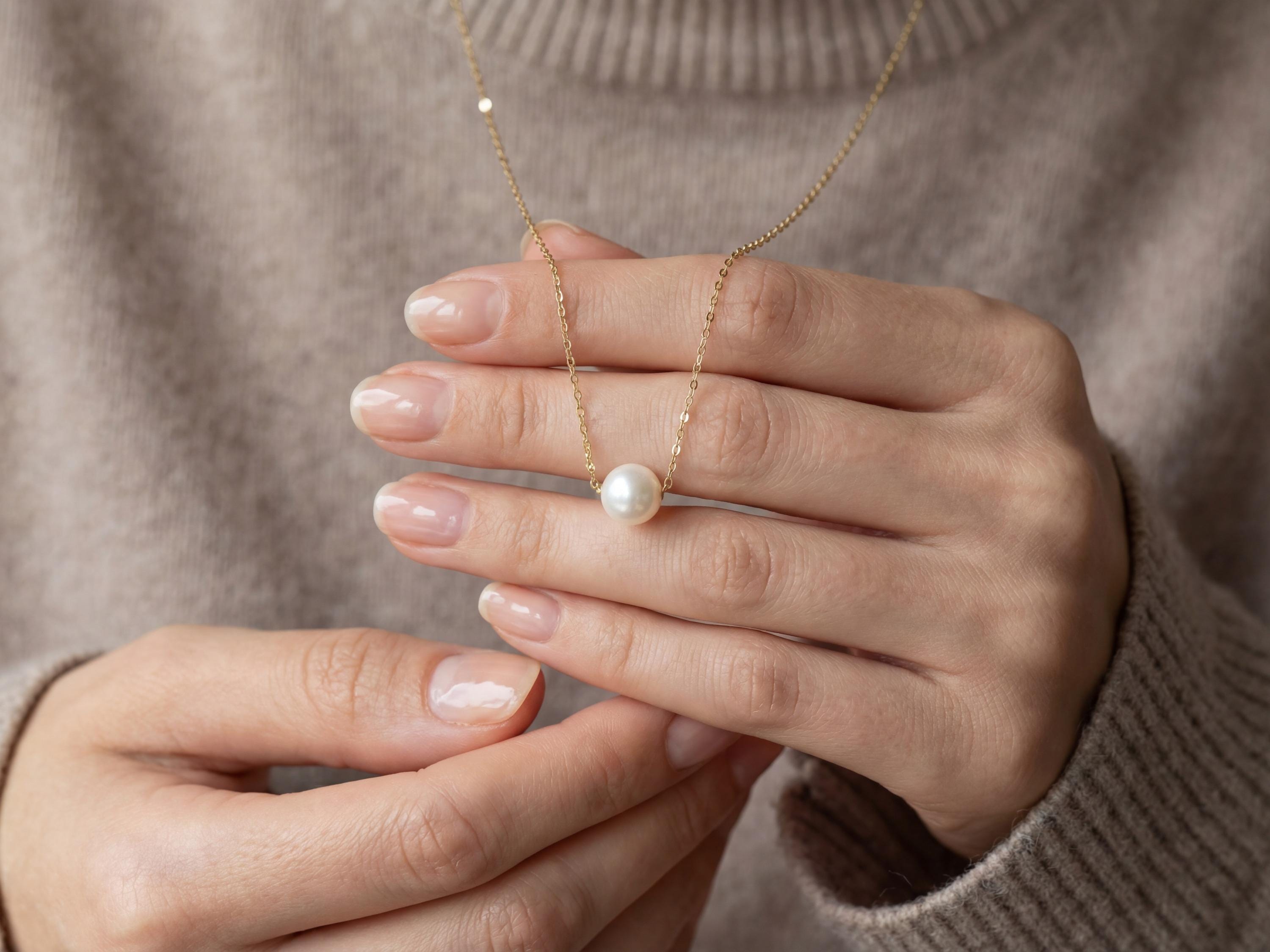 Pearl necklace listing image - Soft editorial hands shot